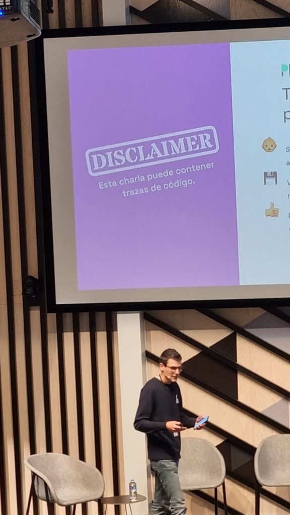 una de las slides del NoCodeDay: "esta charla puede contener trazas de código"